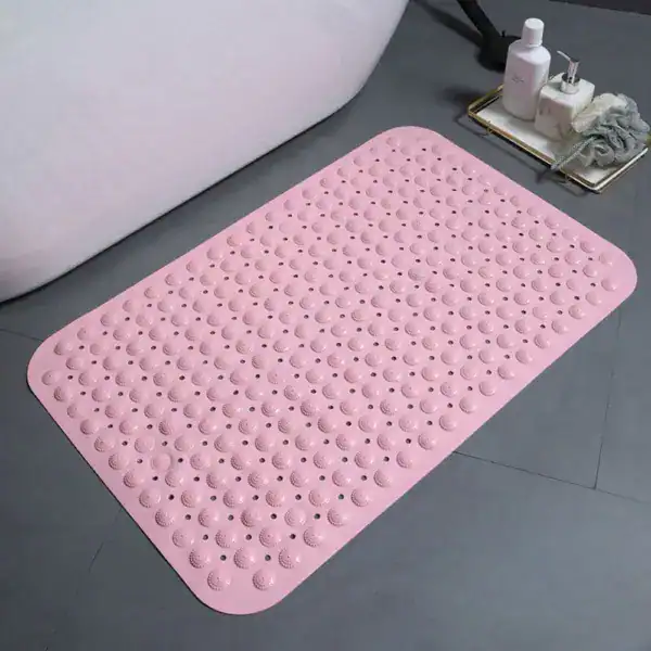 Anti-Rutsch Duschmatte rosa mit rutschfesten Kugeln für sicheren Stand im Bad.