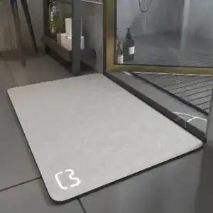Komfort Badematte 80 cm grau mit Logo, ideal für moderne Badezimmer.