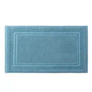 Badematte Baumwolle in Blau mit gerippter Bordüre und strukturierter Oberfläche.