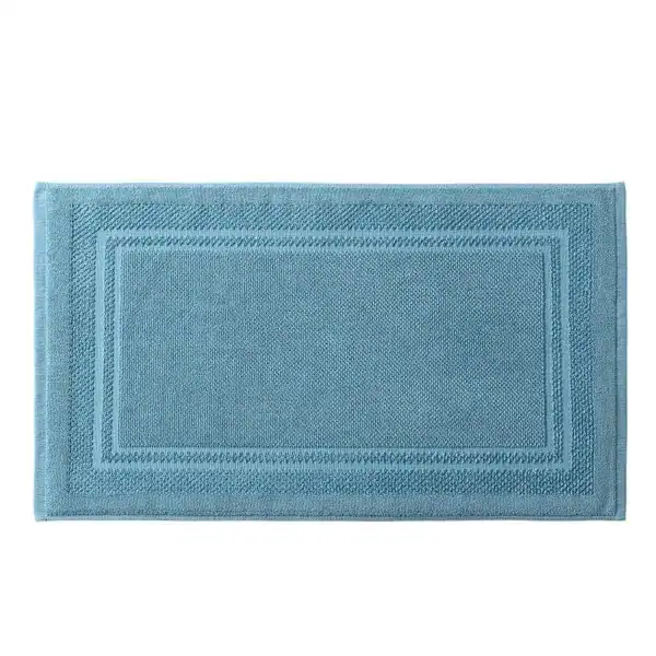Badematte Baumwolle in Blau mit gerippter Bordüre und strukturierter Oberfläche.