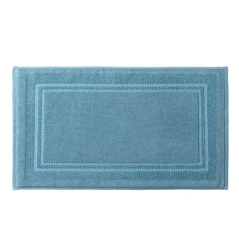 Badematte Baumwolle in Blau mit gerippter Bordüre und strukturierter Oberfläche.
