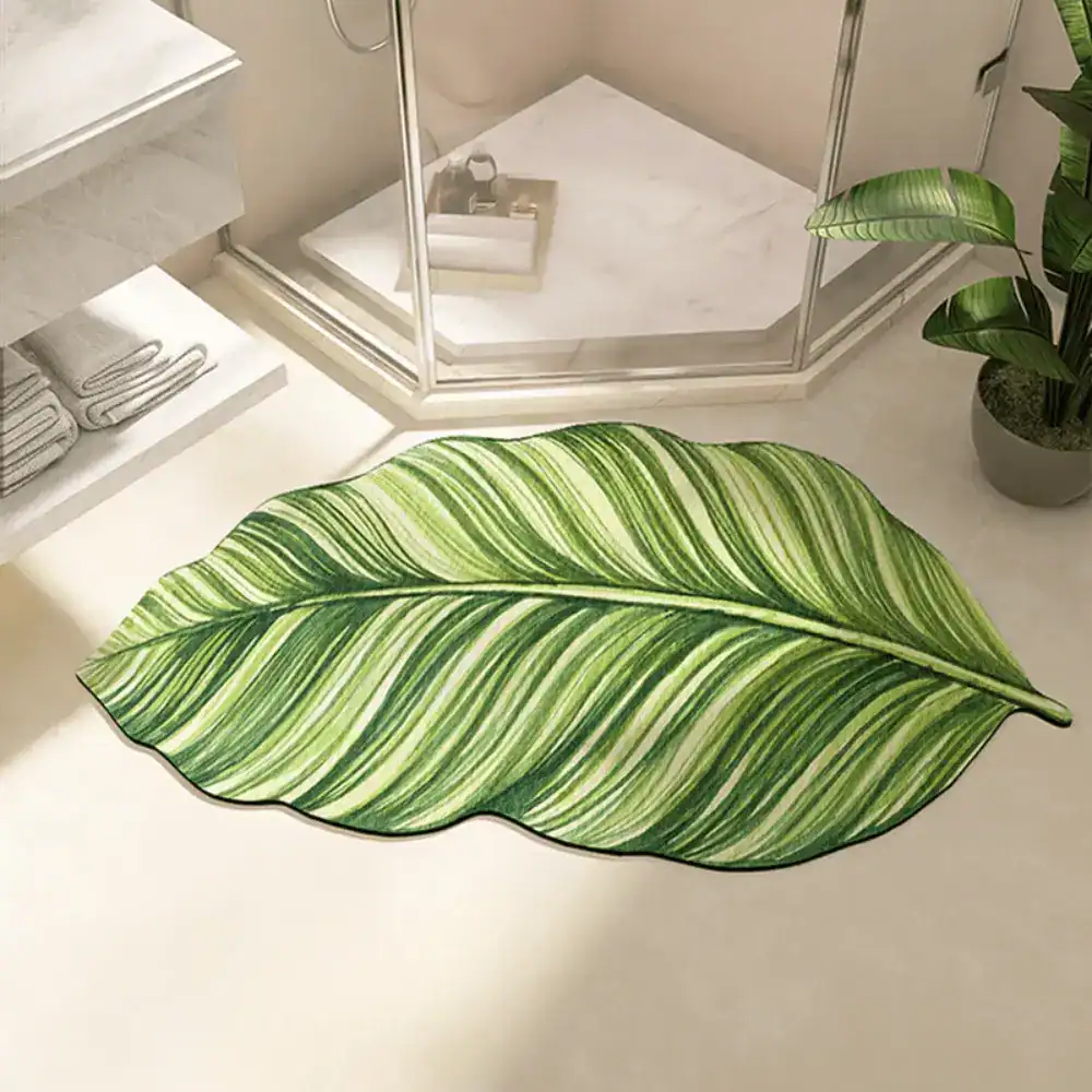 Grüne Blattform Badematte mit tropischem Design für moderne Badezimmer.
