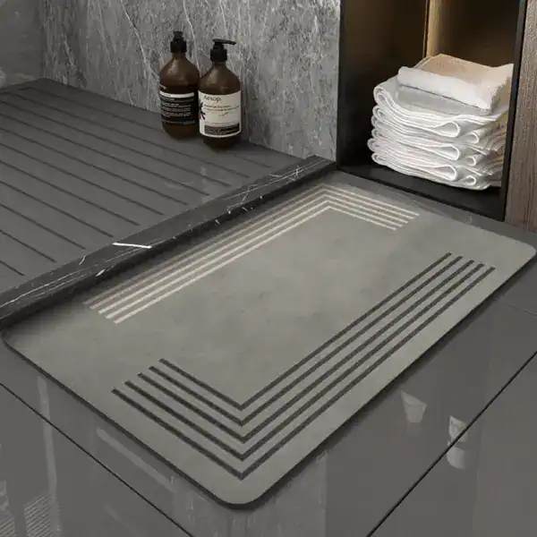 Badematte Granit Grau mit modernem Design und Drainage für stilvolle Badezimmer.