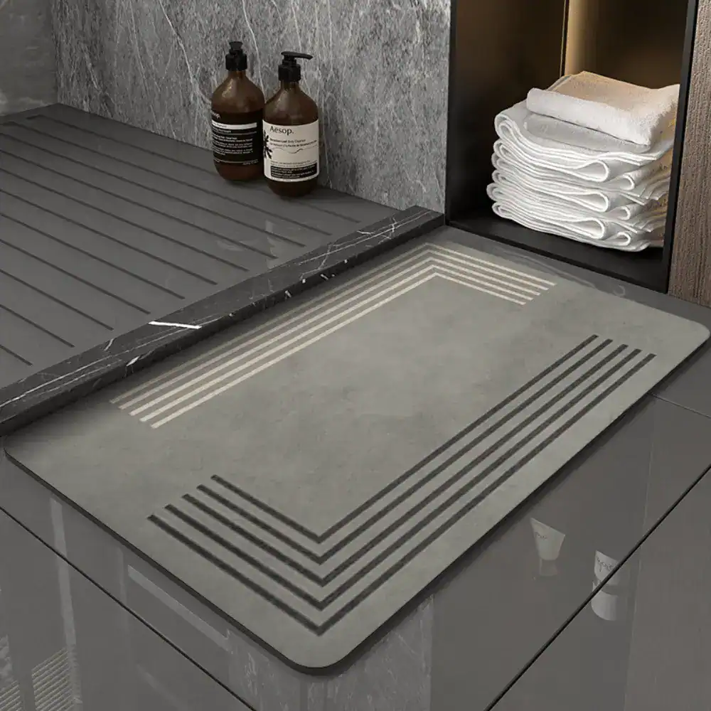 Badematte Granit Grau mit modernem Design und Drainage für stilvolle Badezimmer.