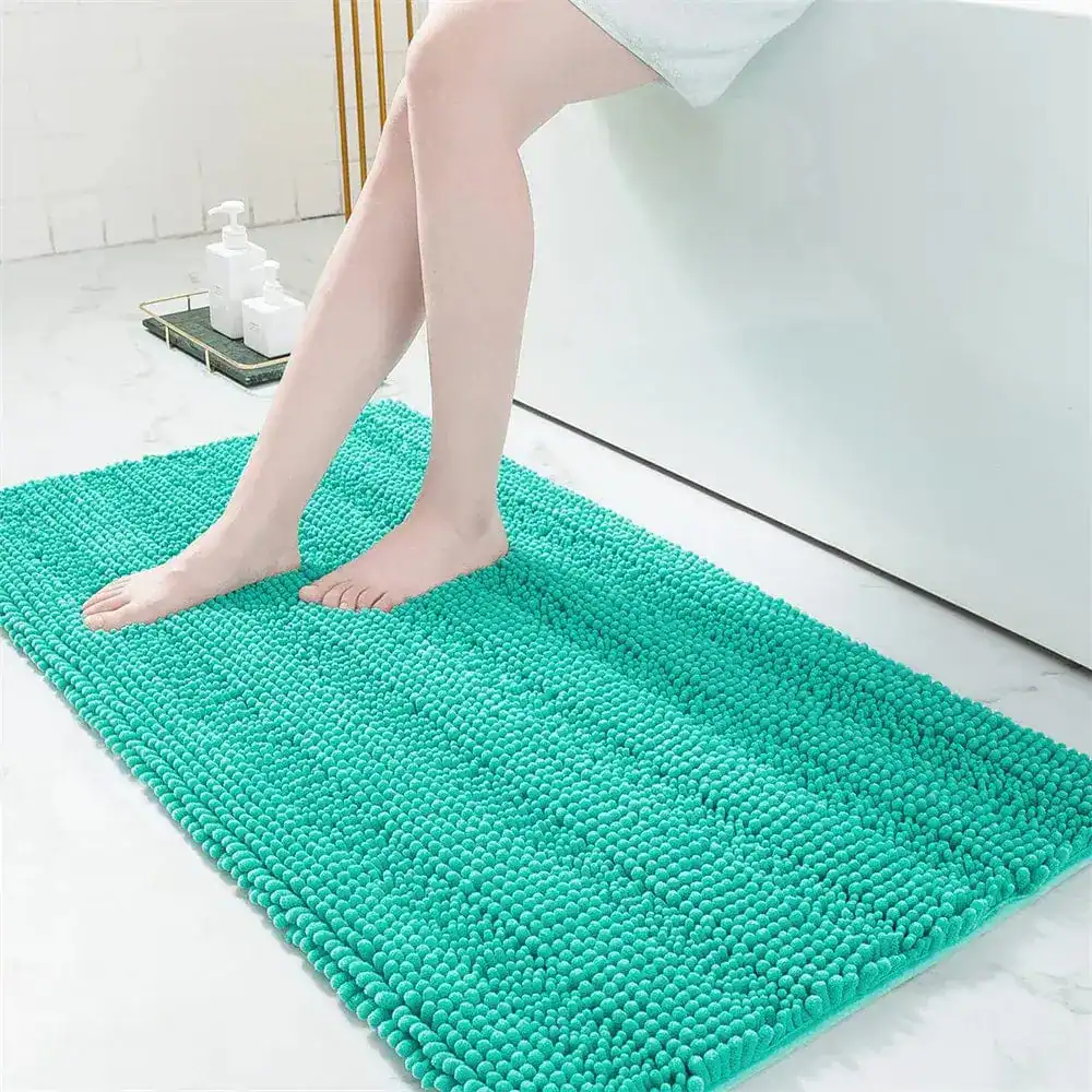 Hochflor Badematte in Türkis, weiches Mikrofaser-Design für Komfort und Sauberkeit im Badezimmer.
