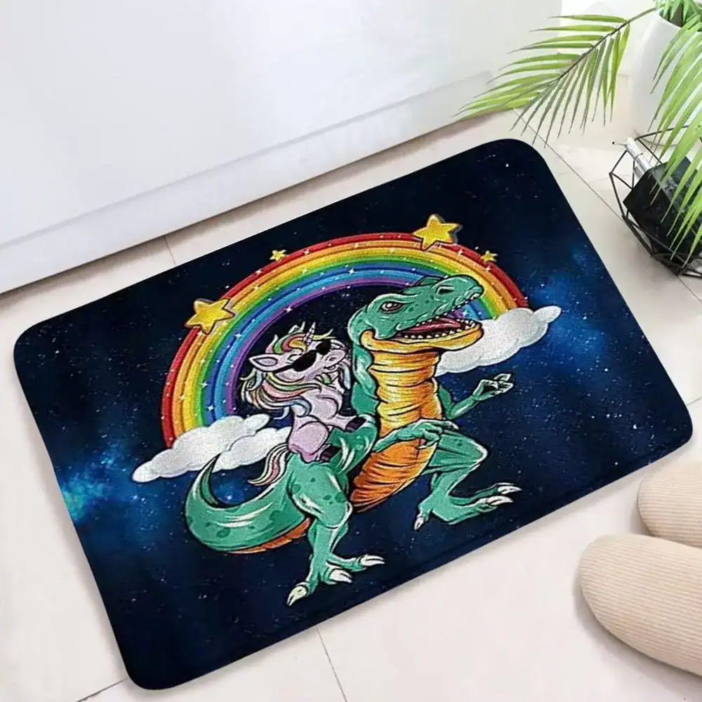 Lustige Badematte mit Dinosaurier und Einhorn unter Regenbogen im Weltraumdesign.