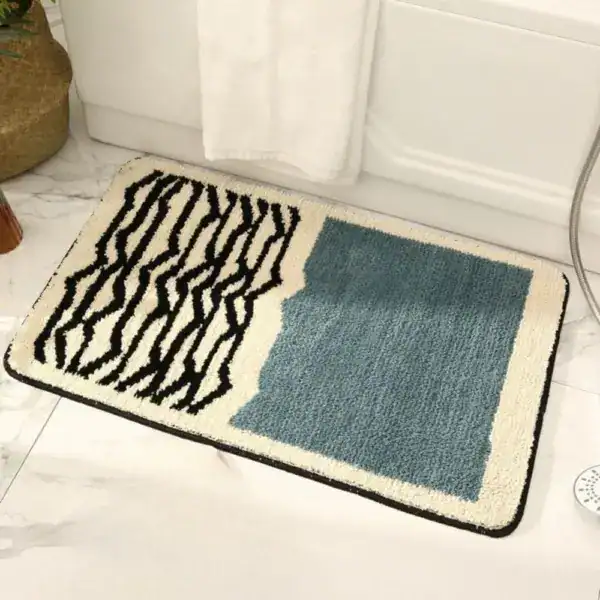 Modernes Badematten-Design mit Zebra-Muster und blauem Feld, ideal für stilvolle Badezimmer.