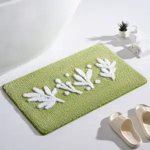 Olivgrüne Badematte mit weißen Blattmotiven, ideal für Komfort und Stil im Badezimmer.