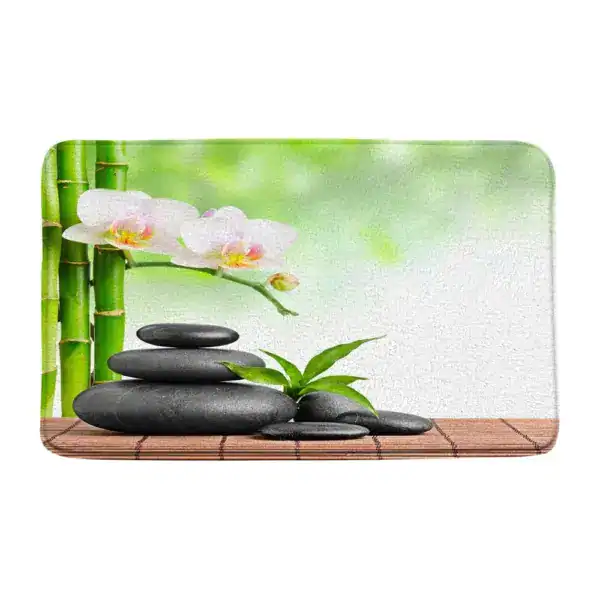 Wellness-Badematte mit Orchidee, Stein und Bambus-Motiv für entspanntes Bad.