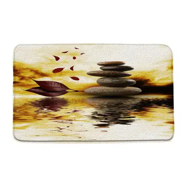 Wellness-Badematte mit Steinpyramide und Herbstblättern im Wasserreflex.