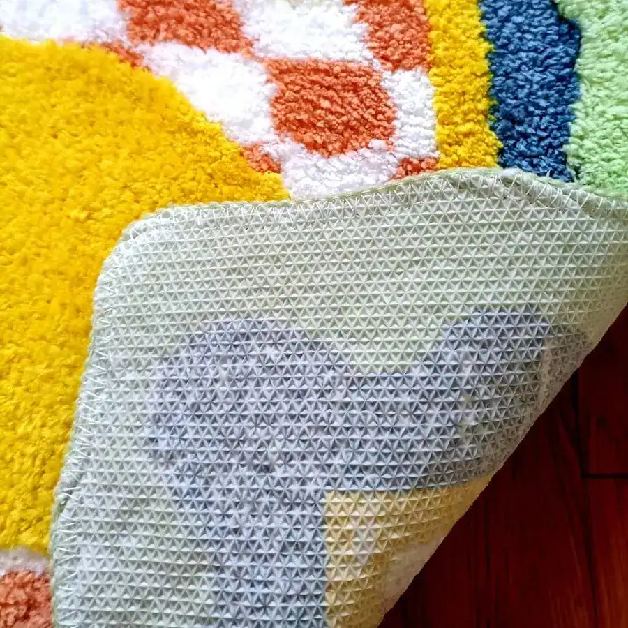 Badematte Zitrone mit rutschfestem Untergrund und farbenfrohem Muster.
