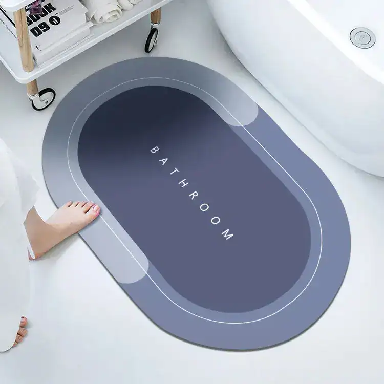 Ovale Badezimmermatte mit 'BATHROOM'-Aufschrift, modernes Design für Bad.