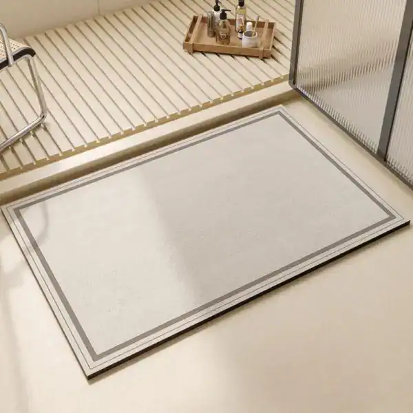 Badezimmermatte Stein, stilvolle Badematte mit grauem Rand für moderne Badezimmer.