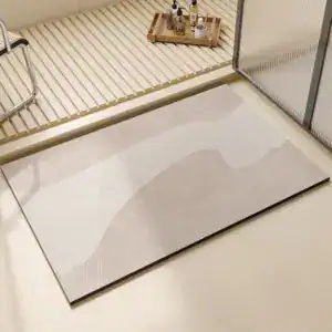 Creme Farbe Badezimmerteppich mit modernem Muster und rutschfestem Design.