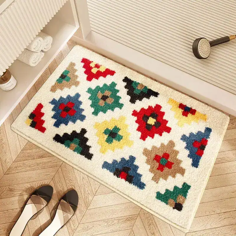Farbiger Badezimmerteppich mit geometrischem Muster, ideal für Bad und Dusche.