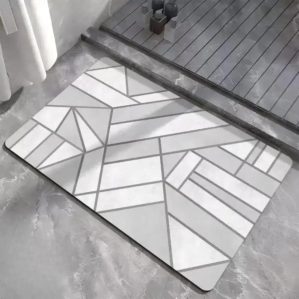 Grauer Badezimmerteppich mit geometrischem Muster, modernes Design für Bad und Dusche.