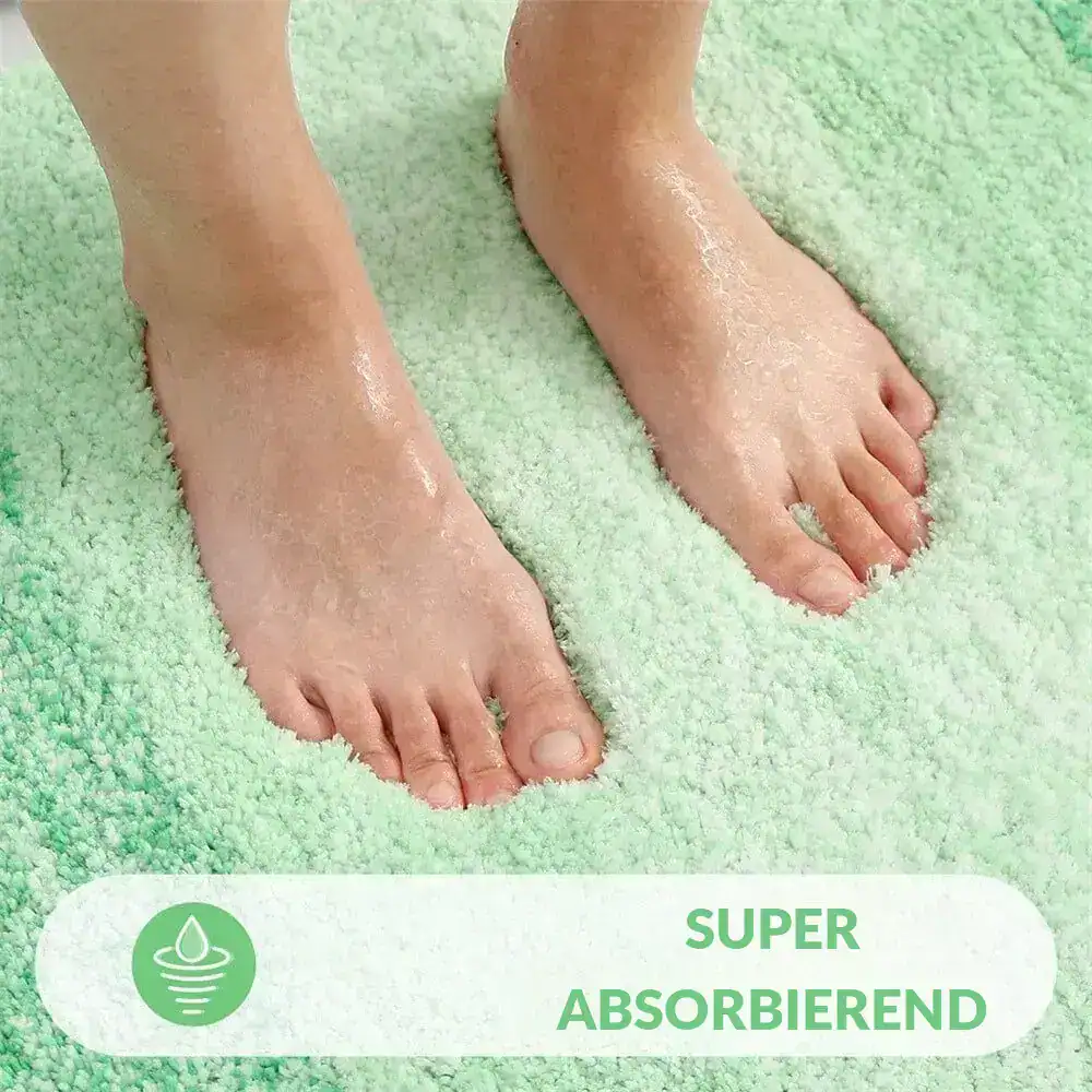 Hellgrüner Badezimmerteppich mit super absorbierender Oberfläche für trockene Füße.