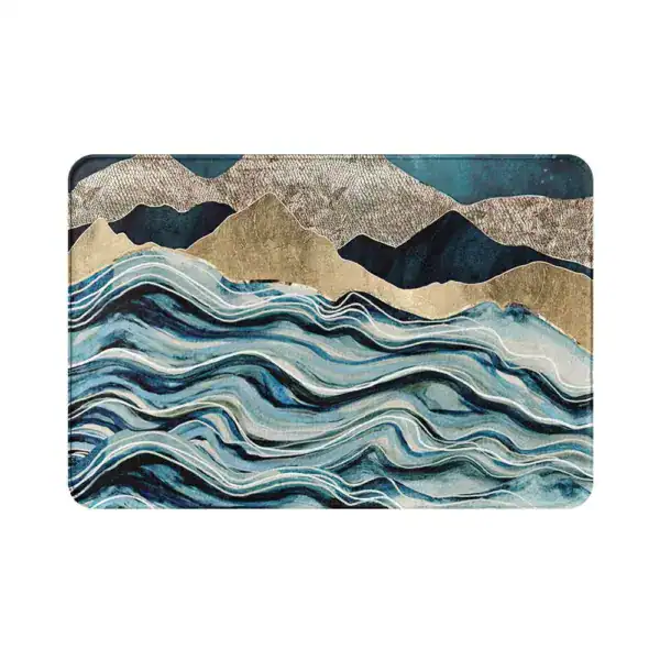 Badezimmerteppich Marmor mit Wellen- und Bergmotiv in Blau und Gold.