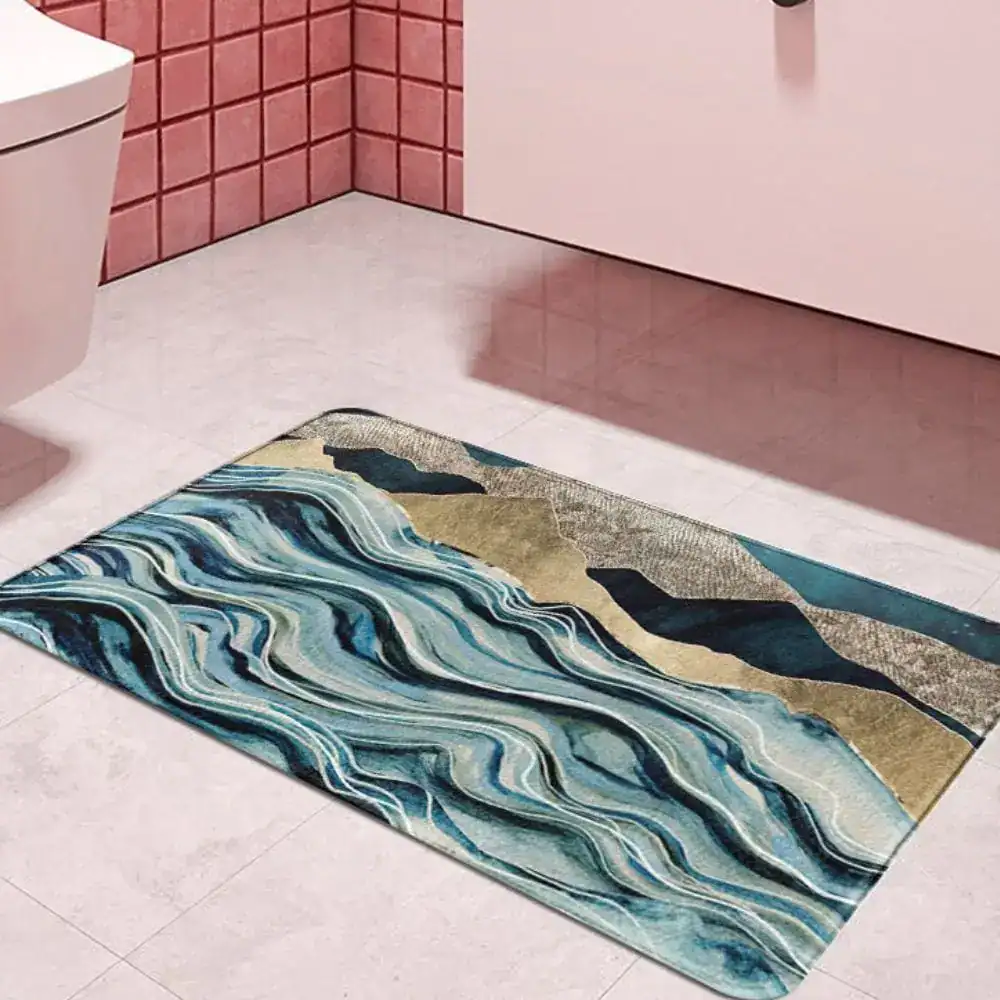 Badezimmerteppich Marmoroptik mit blau-goldenen Wellenmuster, modernes Design für Bad.