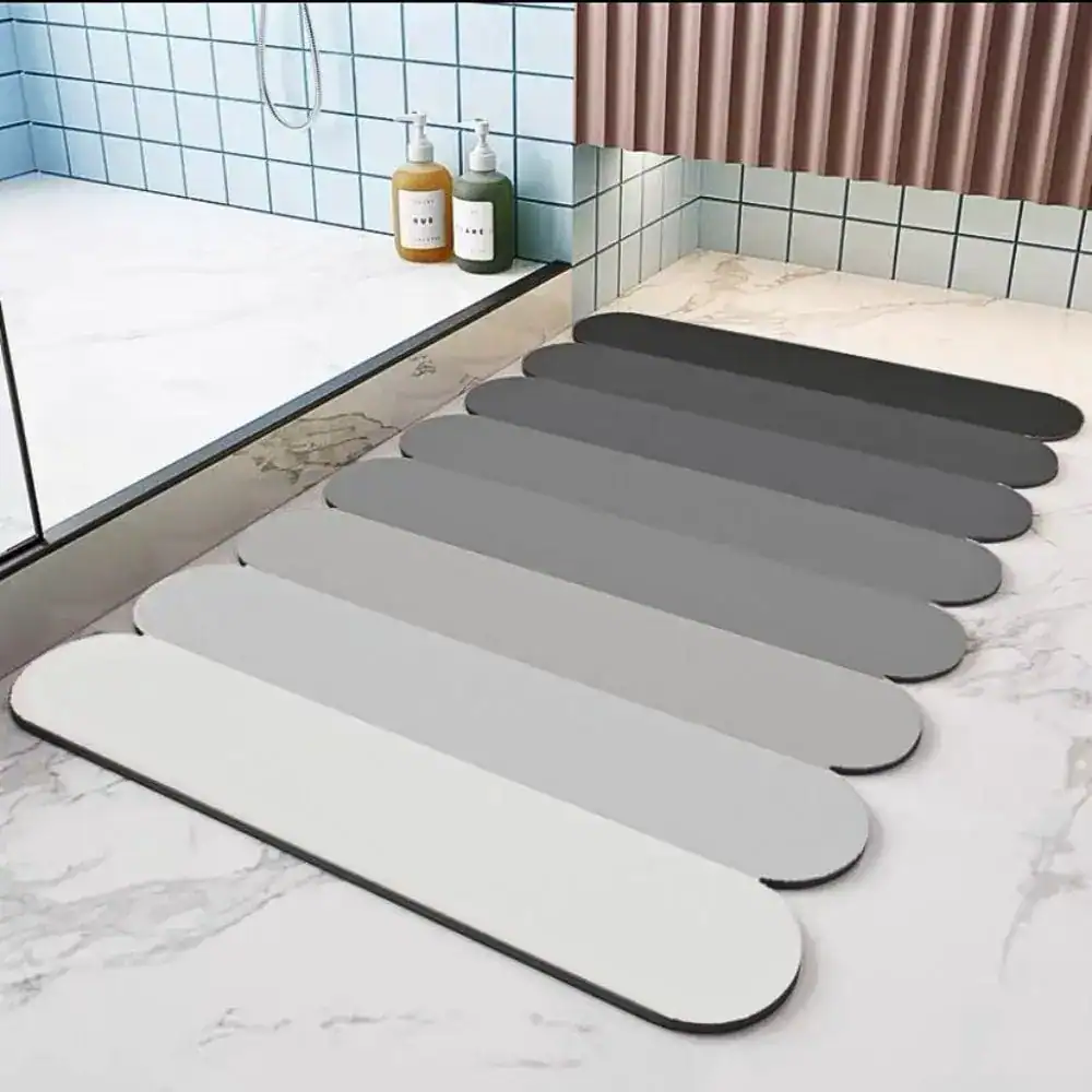 Badezimmerteppich Steine in verschiedenen Grautönen für moderne Badezimmer.