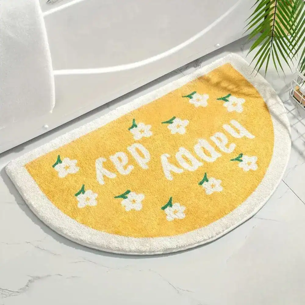 Happy Badematte mit Blumenmotiv und gelbem Design für Badezimmer.