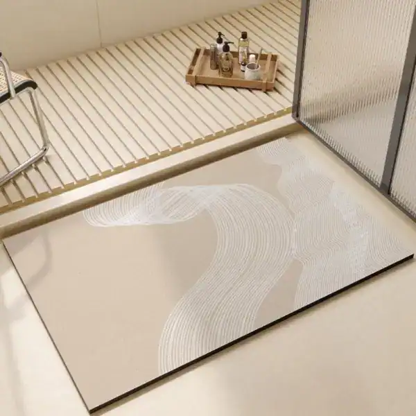 Beige Badvorleger mit modernem Wellenmuster für stilvolle Badezimmergestaltung.