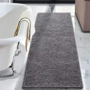 Graue Chenille Badematte mit rutschfestem Textil-Design für moderne Badezimmer.