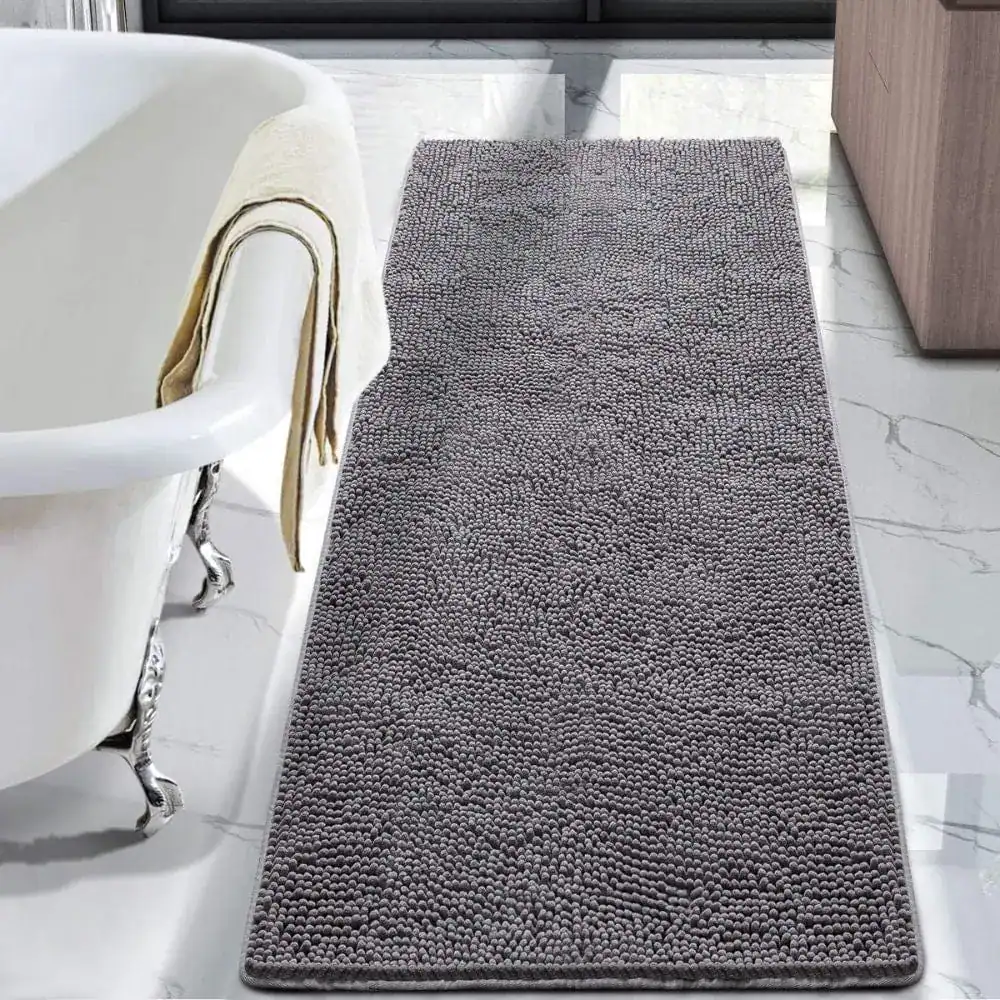 Graue Chenille Badematte mit rutschfestem Textil-Design für moderne Badezimmer.
