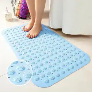Blauer Duschvorleger mit rutschfesten Punkten, ideal für Bad und Dusche.