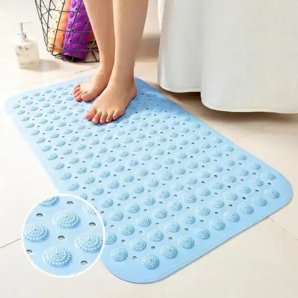 Blauer Duschvorleger mit rutschfesten Punkten, ideal für Bad und Dusche.