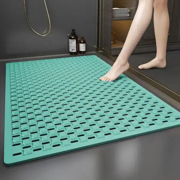 Große rutschfeste Duschmatte in Türkis für Bad und Dusche mit Drainage-Struktur.