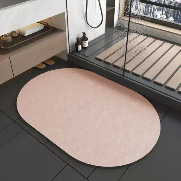 Japanische Badematte rosa oval, Anti-Rutsch-Design für moderne Badezimmer.