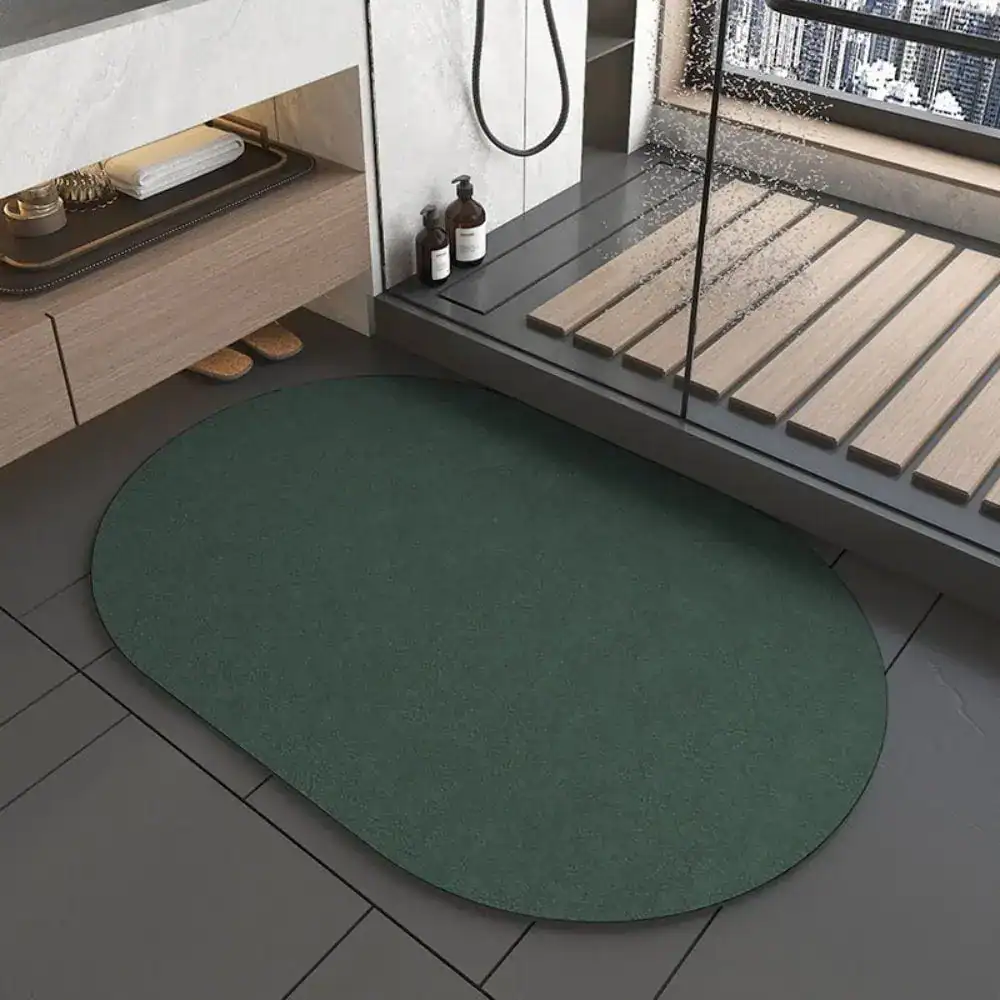 Japanische Badematte oval, dunkelgrün, für moderne Badezimmer mit rutschfestem Boden.